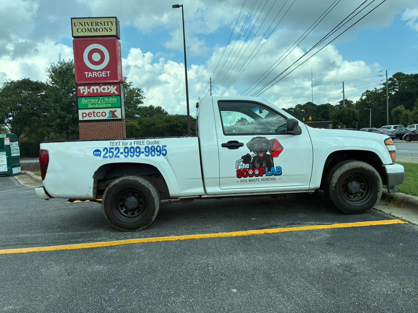 The Scoop Lab branded dog waste removal truck at University Commons in Greenville, North Carolina
